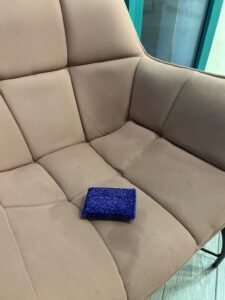 Water ring forming on a fabric couch cushion after uneven air drying 