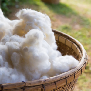 Natural couch fabric fibers showing absorbent texture and irregular weave
